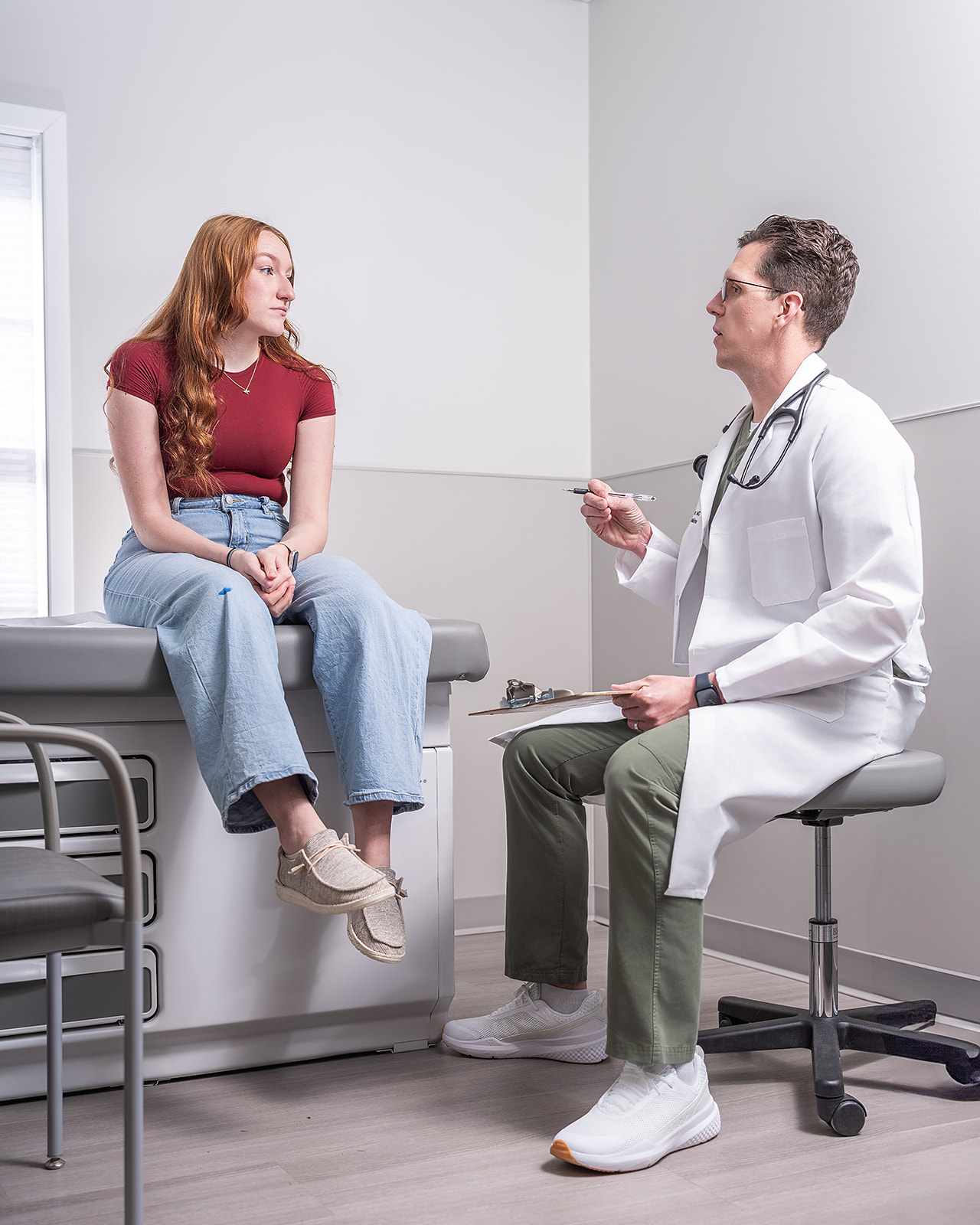 Doctor consulting with patient